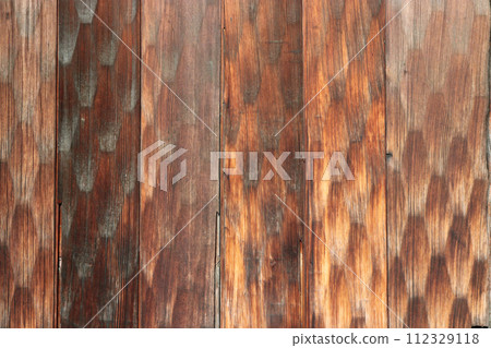 Inset cedar board fence flat texture of an old folk house with diamond hexagonal thin carving pattern 112329118