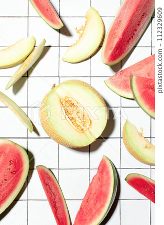Summer food concept with sliced melon and watermelon 112329609