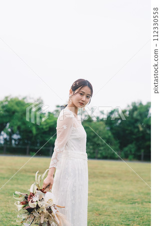 A bride with a bouquet A bride with a bouquet 112330558