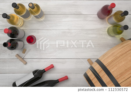 Assorted wine bottles on a wooden background 112330572