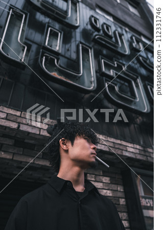 man smoking outdoors man smoking outdoors 112331746