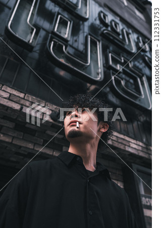 man smoking outdoors man smoking outdoors 112331753