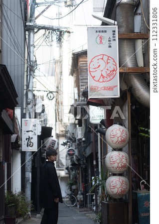 man standing in the alley man standing in the alley 112331806