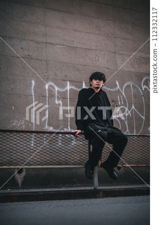 man standing in the alley man standing in the alley 112332117