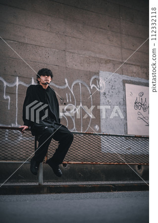 man standing in the alley man standing in the alley 112332118