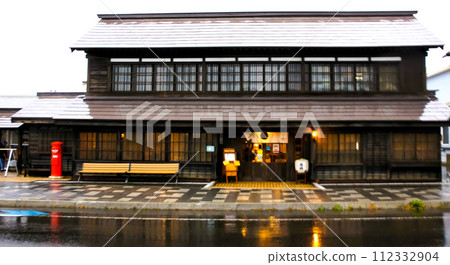 Scenery of the former Rumoi Main Line - Mashike townscape at dusk (after the rain) 112332904