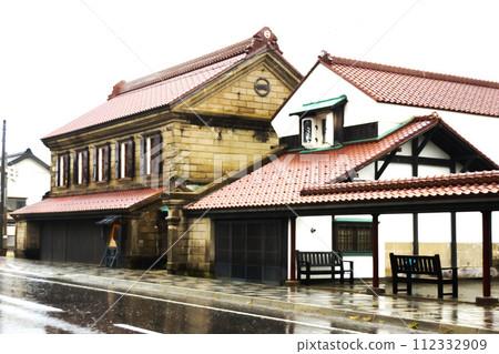 Scenery of the former Rumoi Main Line - Mashike townscape at dusk (after the rain) 112332909