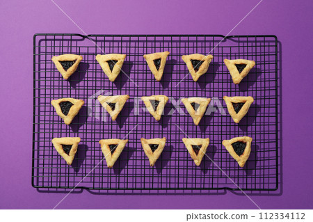 Purim holiday concept, with traditional symbols and decor. 112334112