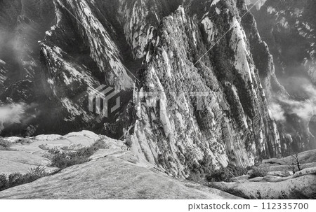 Black and white photo of Huashan National Park mountain landscape, China. Black and white photo of Huashan National Park mountain landscape, China. 112335700