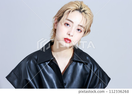 A young woman wearing fashion clothes A young woman wearing fashion clothes 112336268