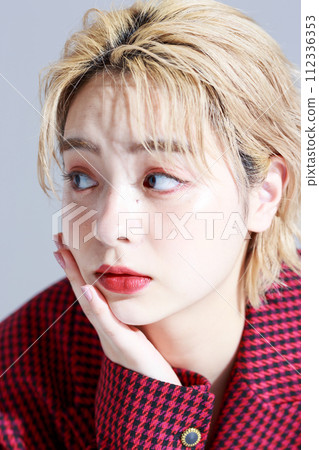 A young woman wearing fashion clothes A young woman wearing fashion clothes 112336353