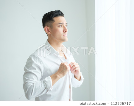 A man wearing a shirt A man wearing a shirt 112336717