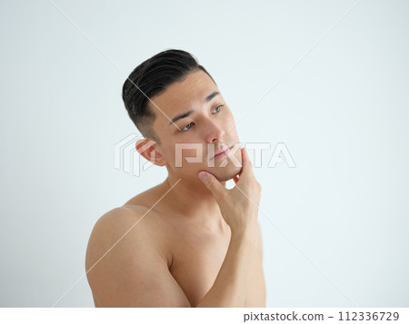 A man doing skin care A man doing skin care 112336729