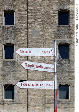 Signposts showing distances from Copenhagen in Denmark Signposts showing distances from Copenhagen in Denmark 112336894