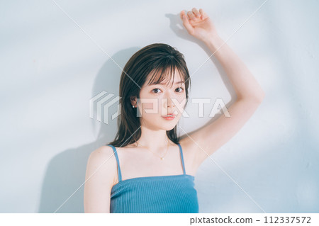 Hair removal image of a young woman 112337572