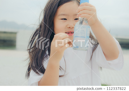 girl with ramune bottle girl with ramune bottle 112337822