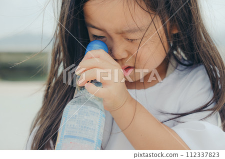 girl with ramune bottle 112337823