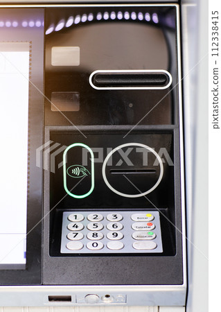 Automated teller machine details, ATM. Cashpoint keypad, NFC contactless wifi system, card reader and receipt printer. Finance, transactions, credit card, money withdrawal, currency, security banking Automated teller machine details, ATM. Cashpoint keypad, NFC contactless wifi system, card reader and receipt printer. Finance, transactions, credit card, money withdrawal, currency, security banking 112338415