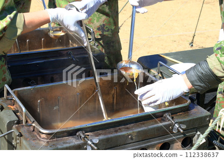 Self-Defense Forces soup kitchen training: Providing hot meals 112338637