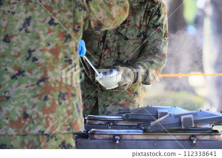 Self-Defense Forces soup kitchen training: Providing hot meals 112338641