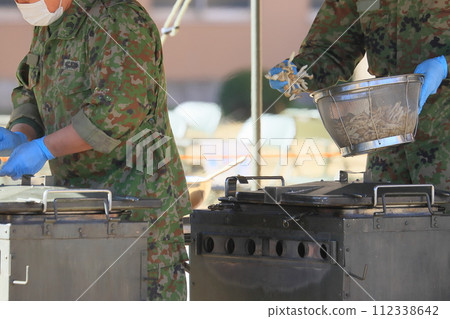 Self-Defense Forces soup kitchen training: Providing hot meals 112338642