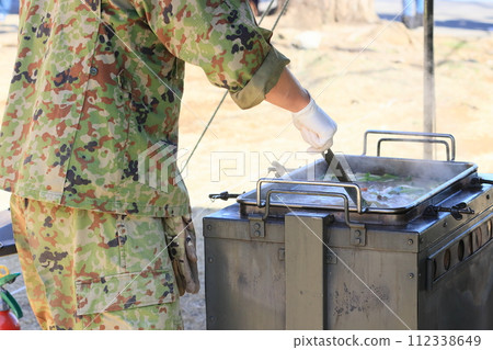 Self-Defense Forces soup kitchen training: Providing hot meals 112338649