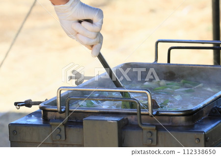 Self-Defense Forces soup kitchen training: Providing hot meals 112338650