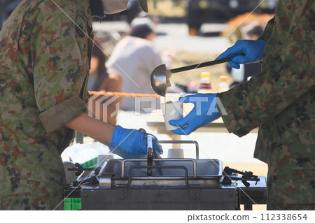 Self-Defense Forces soup kitchen training: Providing hot meals 112338654
