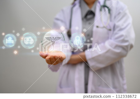 Modern medical icons over female doctor hands. Medical innovative technology 112338672