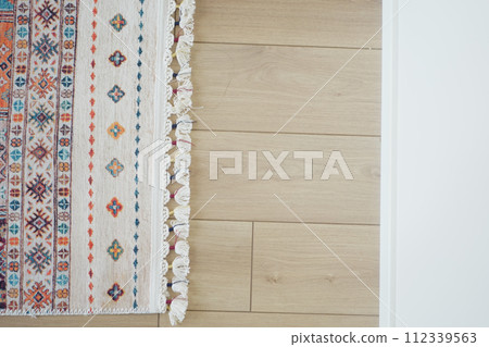carpet texture background on wooden floor with copy space carpet texture background on wooden floor with copy space 112339563