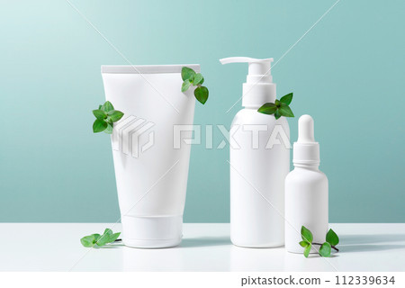 Cosmetic products on the table, white bottles and containers for skin care 112339634