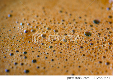 Closeup of hot coffee with bubble Closeup of hot coffee with bubble 112339637