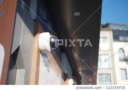 CCTV security camera operating on atm booth  112339758