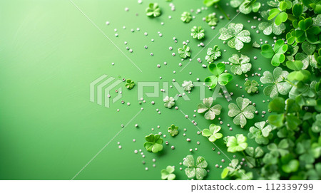Gentle green flowers bathed in mysterious golden light, an ethereal background. St. Patrick's Day concept. 112339799