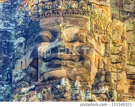 Bodhisattva Avalokiteshvara face on Bayon temple in Angkor, Cambodia Bodhisattva Avalokiteshvara face on Bayon temple in Angkor, Cambodia 112340321