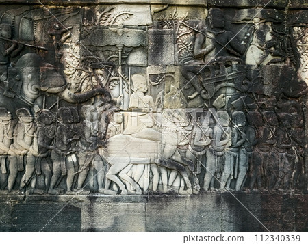 Bas relief sculpture on Bayon temple in Angkor, Cambodia Bas relief sculpture on Bayon temple in Angkor, Cambodia 112340339