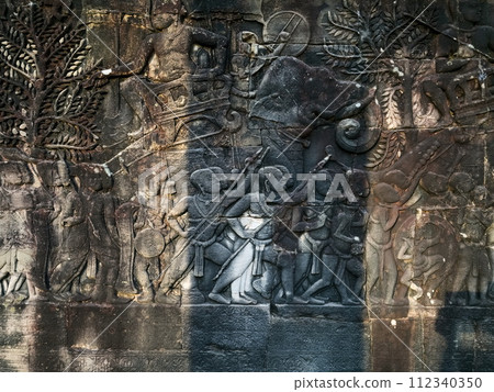 Bas relief sculpture on Bayon temple in Angkor, Cambodia 112340350