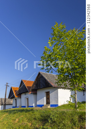 Group of typical outdoor wine cellars in Vlcnov, Southern Moravia, Czech Republic Group of typical outdoor wine cellars in Vlcnov, Southern Moravia, Czech Republic 112342568