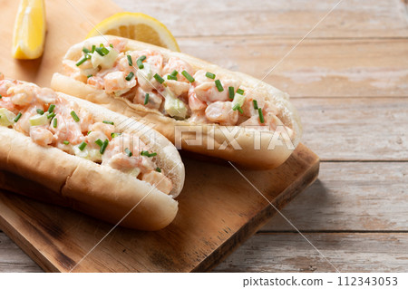 Lobster roll on wooden table Lobster roll on wooden table 112343053