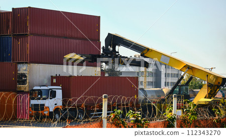 Reach-stacker and container truck 112343270
