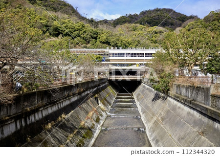 Kobe City, Shin-Kobe Station building and Ikuta River 112344320