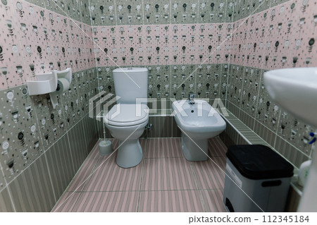 Image of inside freshly cleaned handicap toilet in a hospital, clinic Image of inside freshly cleaned handicap toilet in a hospital, clinic 112345184