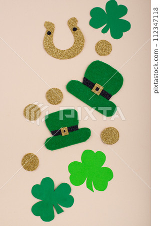 St. Patrick's Day concept with leprechaun hat, gold coins and horseshoe St. Patrick's Day concept with leprechaun hat, gold coins and horseshoe 112347118
