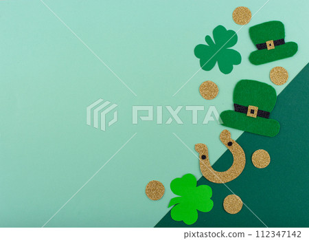 St. Patrick's Day concept with leprechaun hat, gold coins and horseshoe 112347142