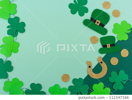 St. Patrick's Day concept with leprechaun hat, gold coins and horseshoe St. Patrick's Day concept with leprechaun hat, gold coins and horseshoe 112347166