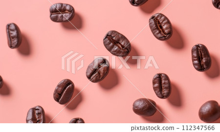 Coffee beans scattered on a pink background creating a seamless pattern. 112347566