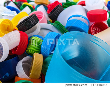Lots of different plastic bottle caps. Garbage sorting 112348083