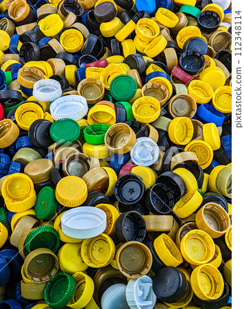 Lots of different plastic bottle caps. Garbage sorting Lots of different plastic bottle caps. Garbage sorting 112348114