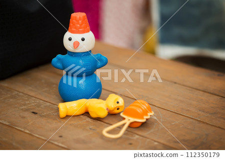 Old Soviet toys are a snowman, a monkey and a rattle. Retro Toys 112350179