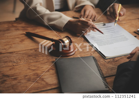 Good service cooperation, Consultation of Businesswoman and Male lawyer or judge counselor having team meeting with client, Law and Legal services concept. Good service cooperation, Consultation of Businesswoman and Male lawyer or judge counselor having team meeting with client, Law and Legal services concept. 112351241